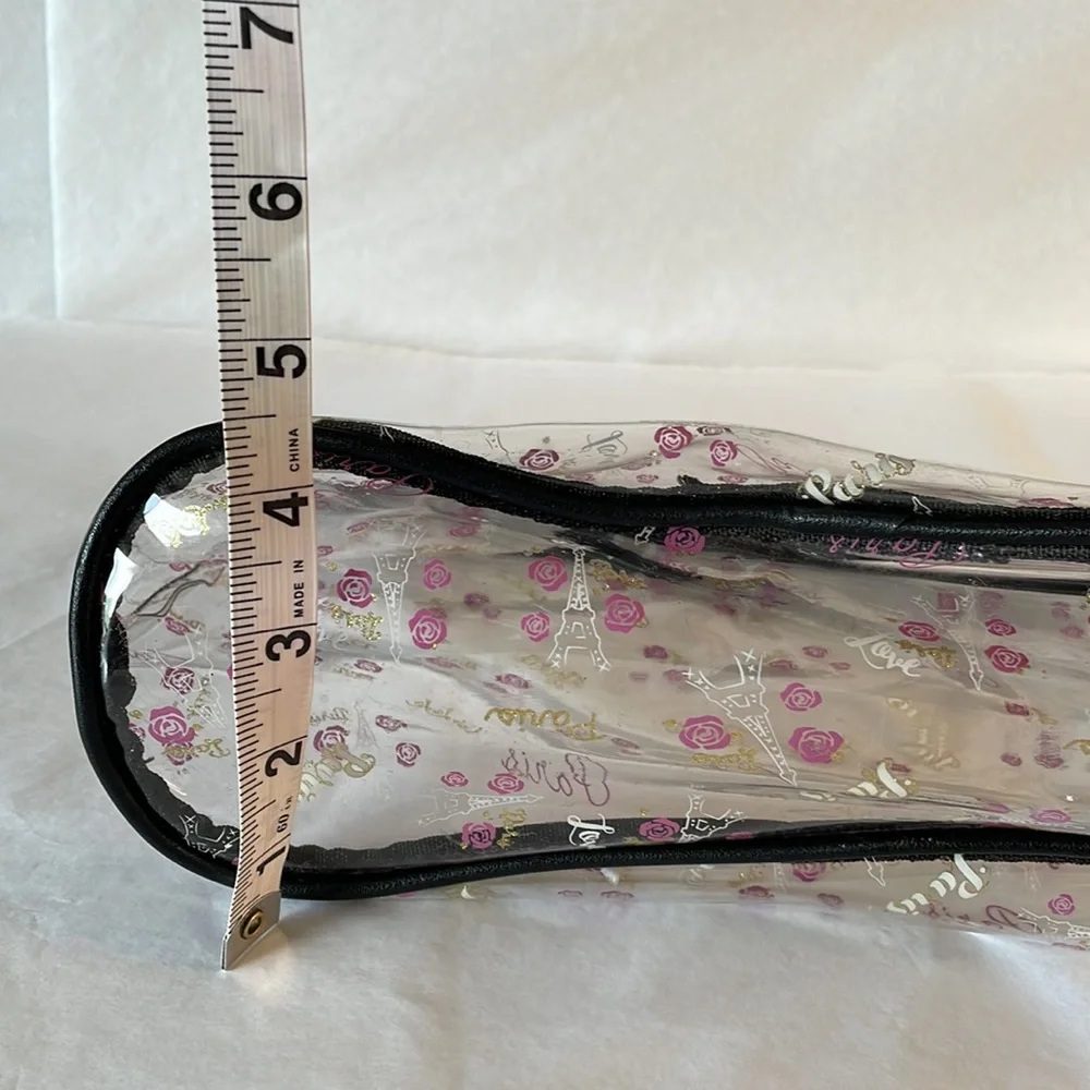 Clear cosmetic makeup bag with pink roses and Eiffel Tower gold hardware tassel
